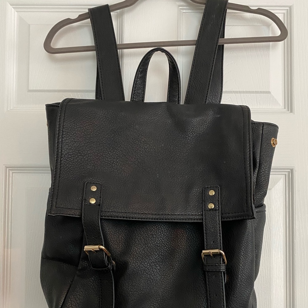 Black vegan leather backpack w/ snap closures